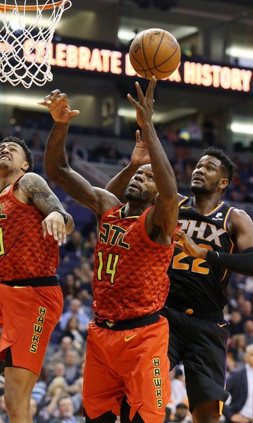 Collins, Young lift Suns past Hawks, 118-112